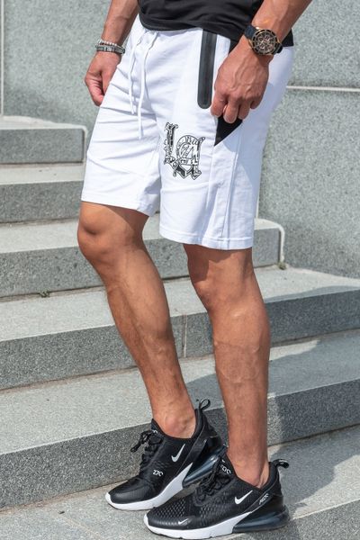 LA valkoiset collegeshortsit vetoketjutaskuilla JERONE